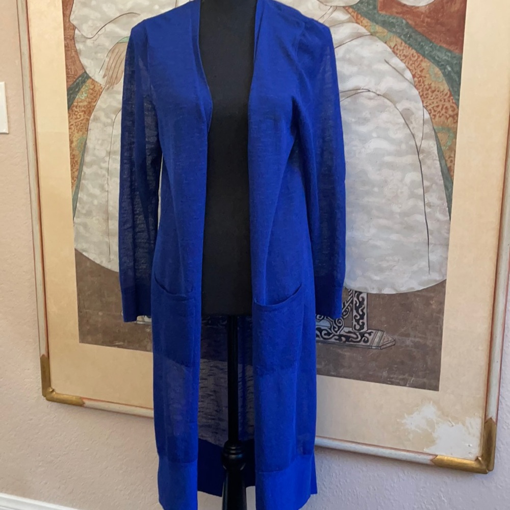 A woman’s duster and a royal blue color it’s from Chicos it’s a size 1